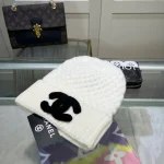 Chanel Knit Beanie:Pineapple stitch chunky knit beanie. 3D raised thick yarn appliqué logo. - Image 5