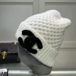 Chanel Knit Beanie:Pineapple stitch chunky knit beanie. 3D raised thick yarn appliqué logo. - Image 3