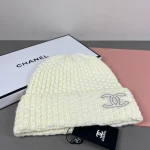 Chanel Knit Beanie:Chunky waffle honeycomb knit beanie. Hollow double stitched outline logo. - Image 4