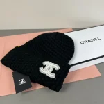 Chanel Knit Beanie:Chunky waffle honeycomb knit beanie. Hollow double stitched outline logo. - Image 3