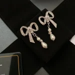 Chanel Sweet CC Logo CZ Bowknot Faux Pearl Drop Earrings-White Gold plated brass - Image 6
