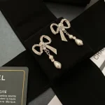 Chanel Sweet CC Logo CZ Bowknot Faux Pearl Drop Earrings-White Gold plated brass - Image 5