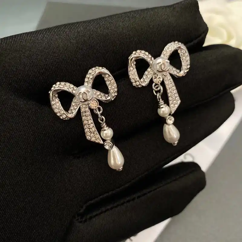 wsxc1790615413386_6 Chanel Sweet CC Logo CZ Bowknot Faux Pearl Drop Earrings-White Gold plated brass - Image 1